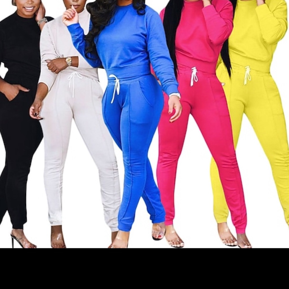 Women 2 Piece TrackSuits…(Blue Left)